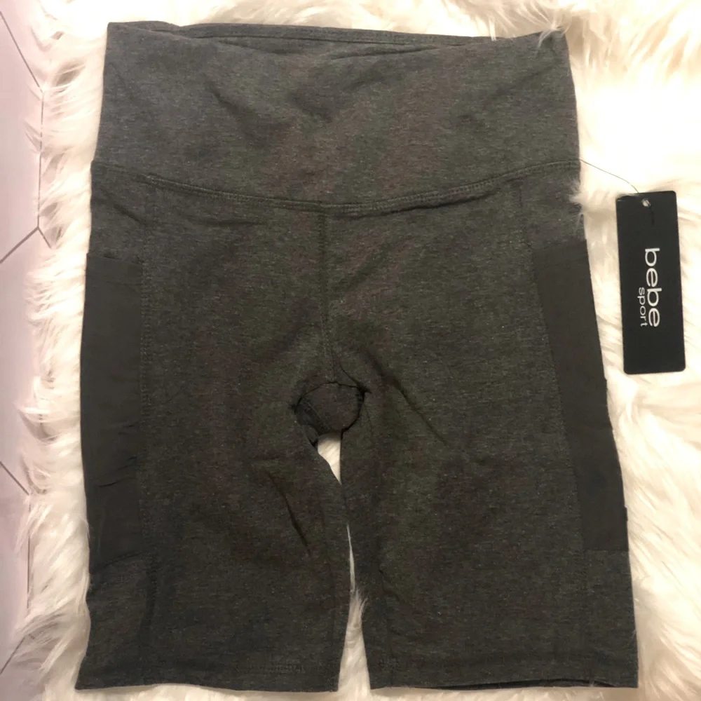 Bebe sport bike shorts with mesh pockets on both sides. Shorts are size small. - Picture 1 of 3